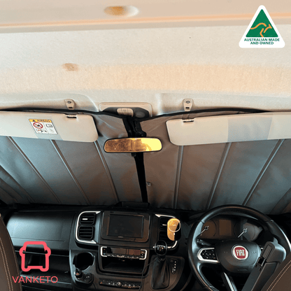 A Vanketo truck cab sunshade installed across the windshield of a vehicle interior, shown above the dashboard and steering wheel with a Vanketo logo in the corner and an Australian Made and Made in Australia badge.